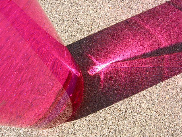 Pink Nalgene bottle and shadow