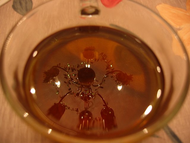 Chandelier reflection in tea mug, Fairfax, Virginia