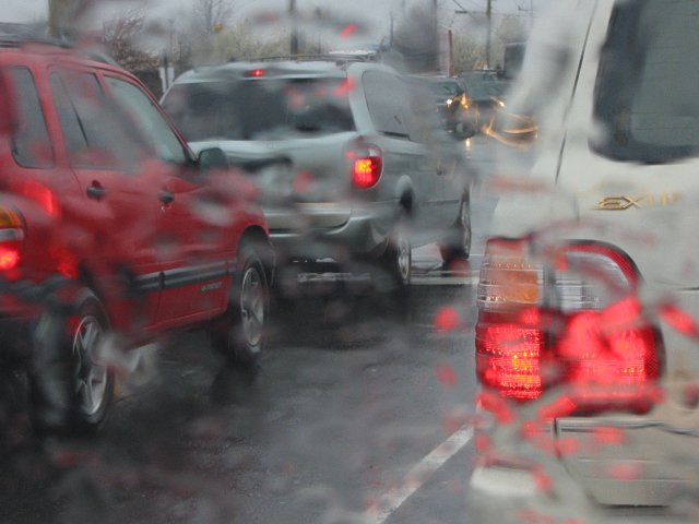 Cars at traffic light on rainy morning, Chantilly, Virginia
